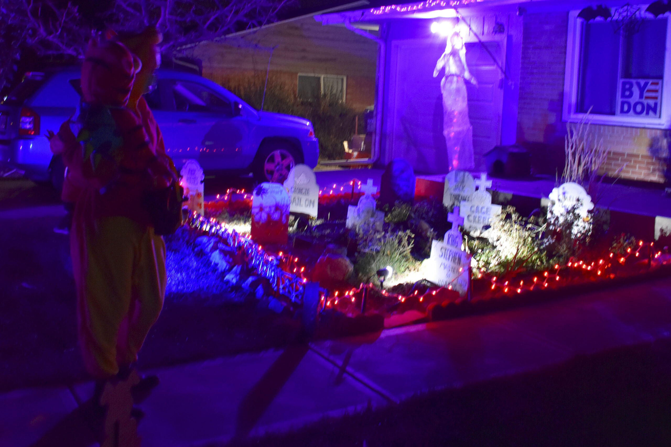 A woman takes her son to trick-or-treat at McCawley's house. Westminster, Colo., Oct. 31, 2020. (Kerry McCawley/MSU Denver)